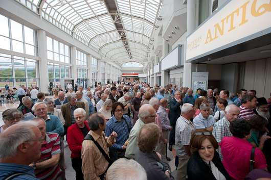 The crowds awaiting the opening of the recent Antiques For Everyone Fair at the National Exhibition Centre in Birmingham were significantly swelled by overseas buyers, according to Clarion Events, the fair’s organizers. Image courtesy of Clarion Events and the NEC.